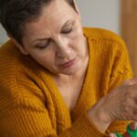 woman wearing string finger reminder scaled 1